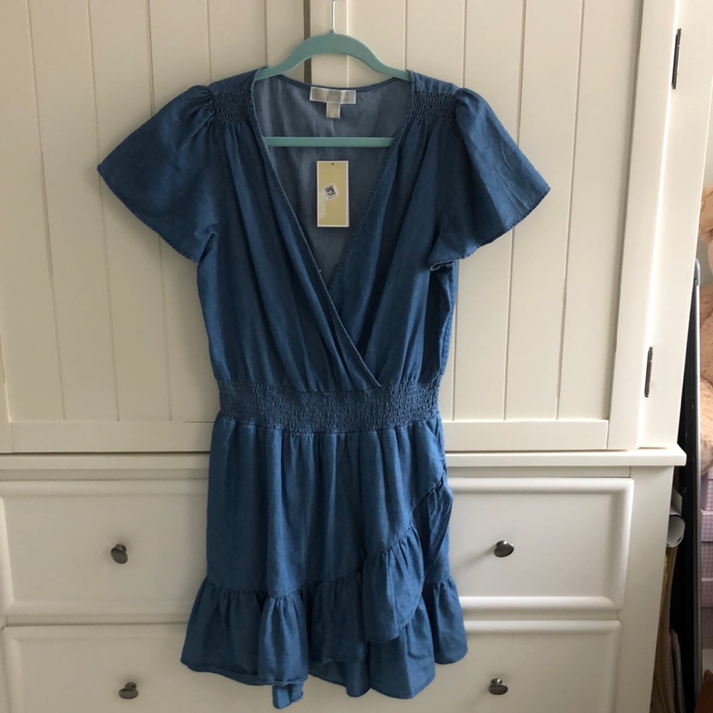 NWT Michael Kors denim blue cotton dress with ruffle bottom size medium.